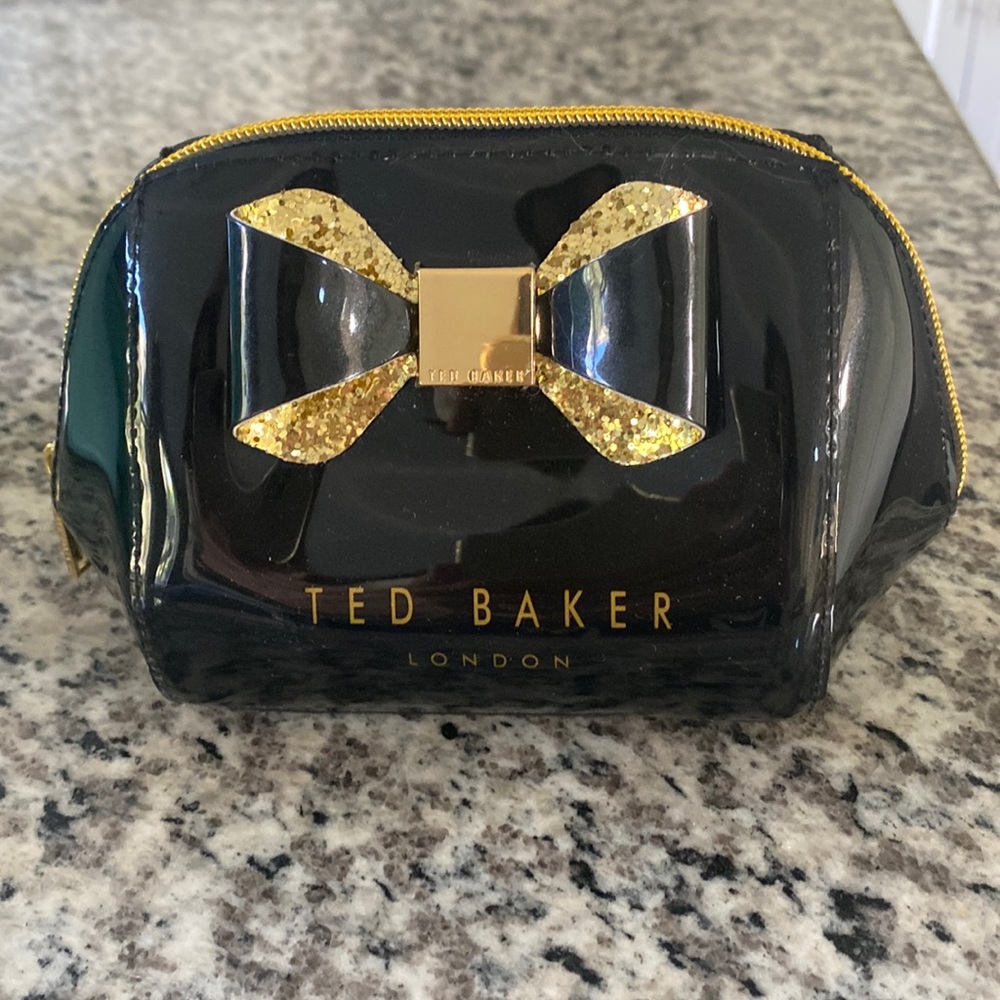 Ted Baker compact cosmetic case.  Black with gold finish. NWOT.